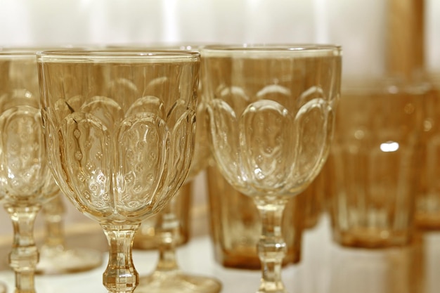 Glass crystal tableware on long legs cups