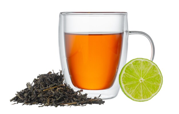 Glass cup of black tea with bergamot isolated