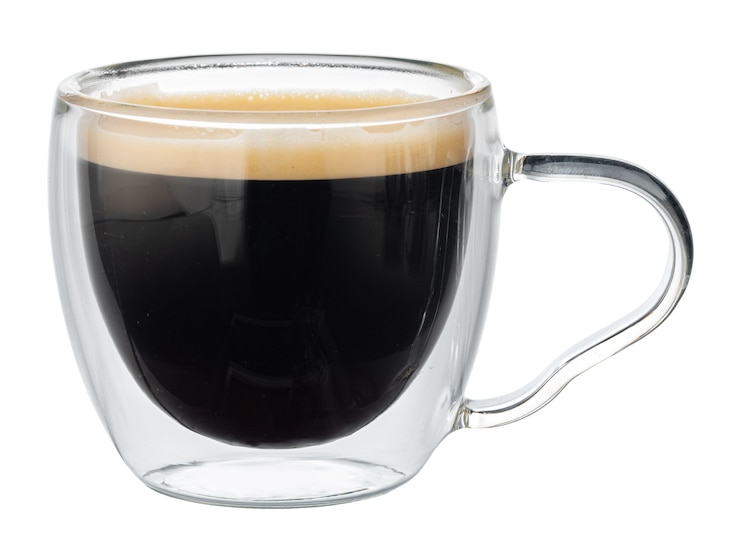 Photo glass cup of espresso coffee isolated