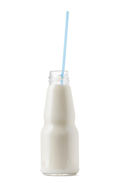 Glass cup of milk with a straw isolated on white