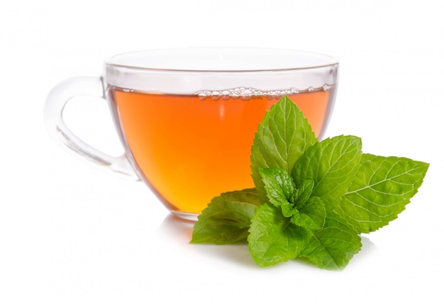 Glass cup of Tea with mint leaves isolated on white space