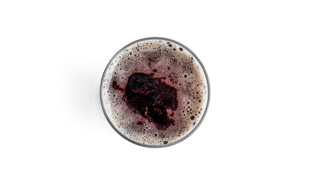 Glass of dark beer isolated on white.