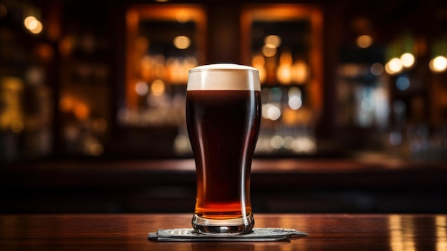 Glass of dark beer on a wooden table in a pub or restaurant