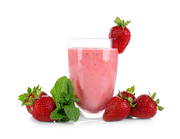 Glass of delicious strawberry homemade smoothie on white background