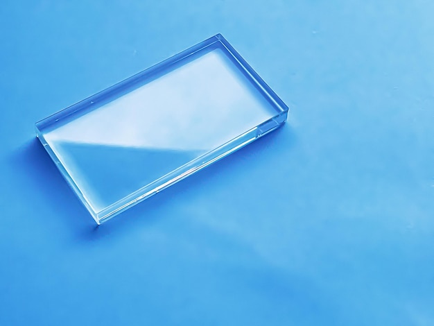 Glass device on blue background future technology and abstract screen mockup design