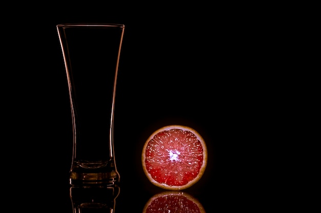 Glass for a drink on a black background