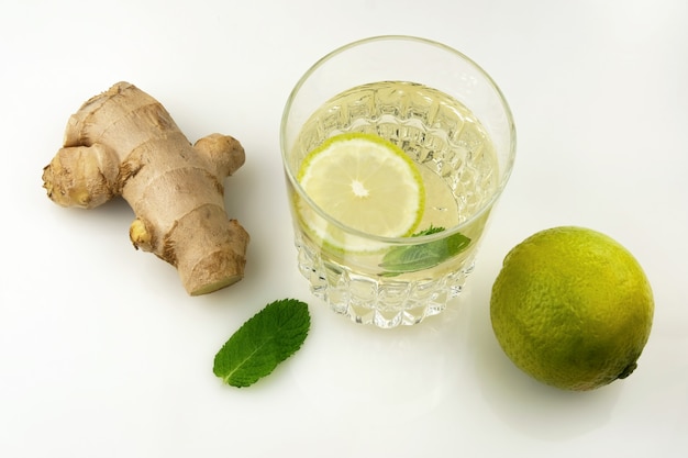 Glass of drink with citrus juice,