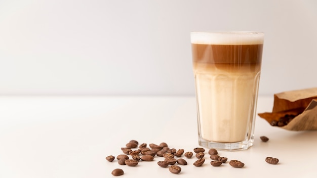 Photo glass filled with coffee and milk