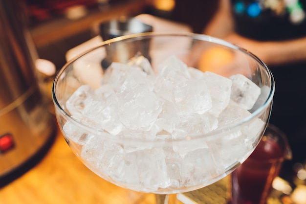 Glass filled with ice cubes