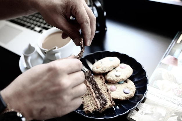 Glass of filter coffee with delicious cookies