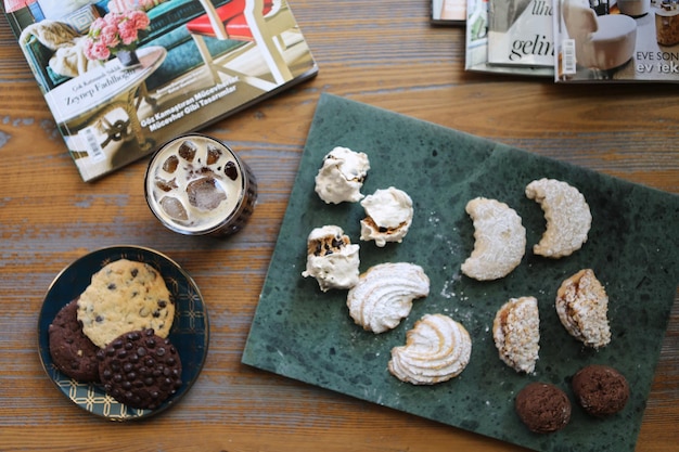 Glass of filter coffee with delicious cookies