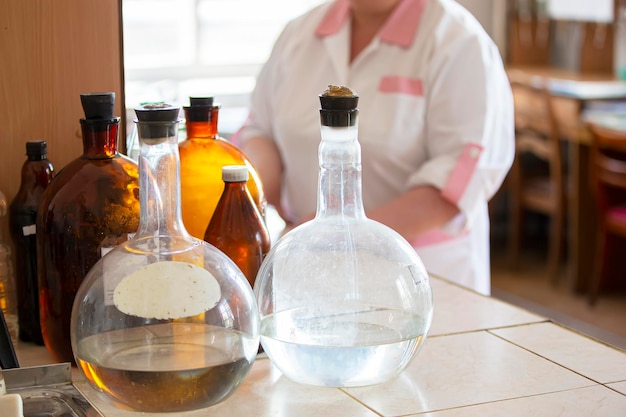 Glass flasks on a laboratory table