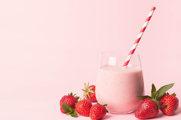 Glass of fresh strawberry milkshake