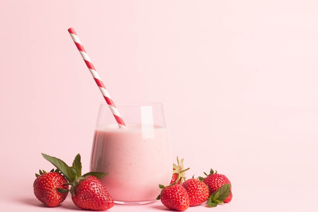 Glass of fresh strawberry milkshake