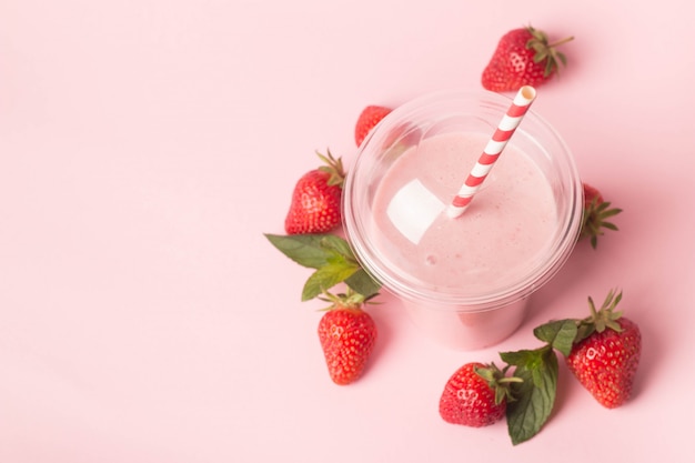 Glass of fresh strawberry milkshake