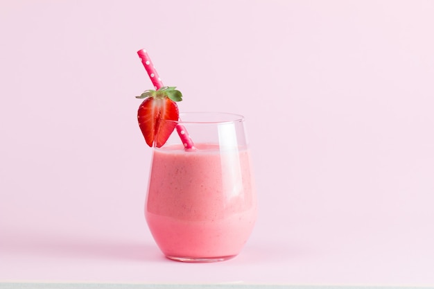 A glass of fresh strawberry smoothie 