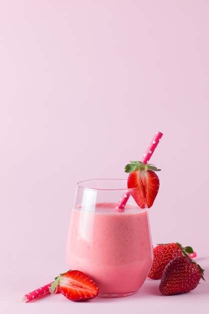 A glass of fresh strawberry smoothie 