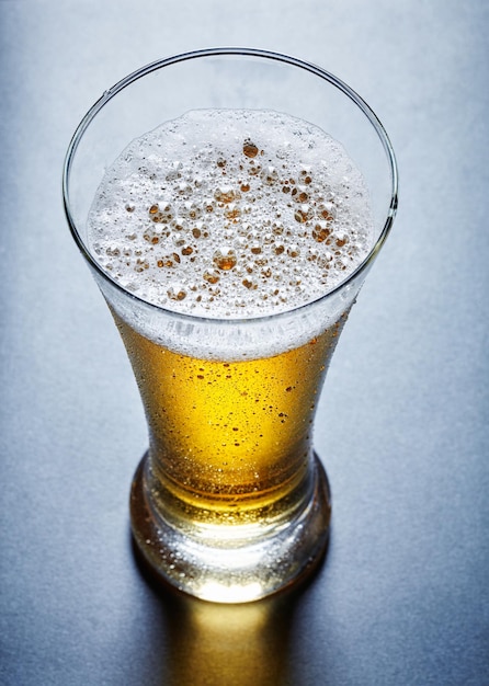 Glass full of beer, view from above