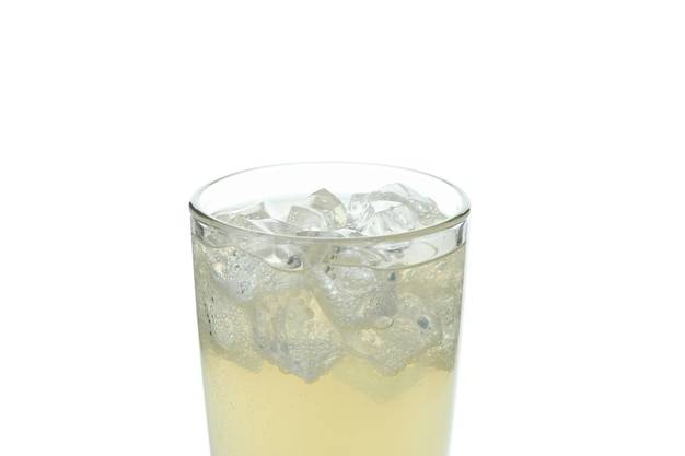 Glass of ginger beer with ice isolated on white