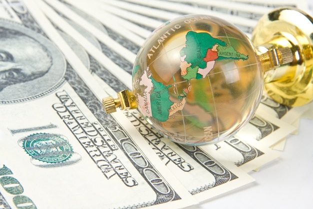 Photo glass globe and dollars