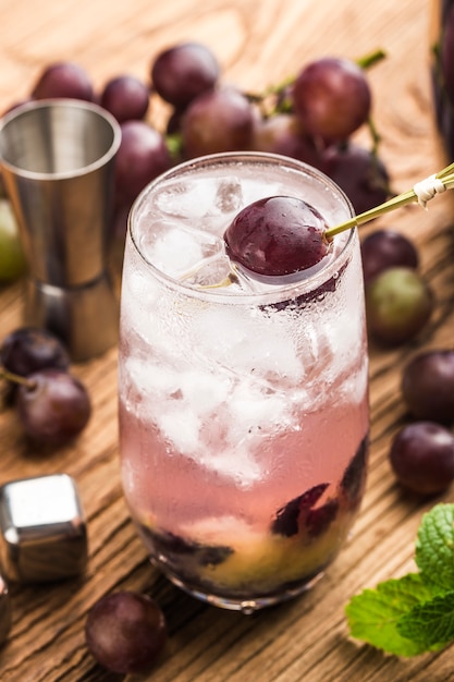 A glass of grape juice drink