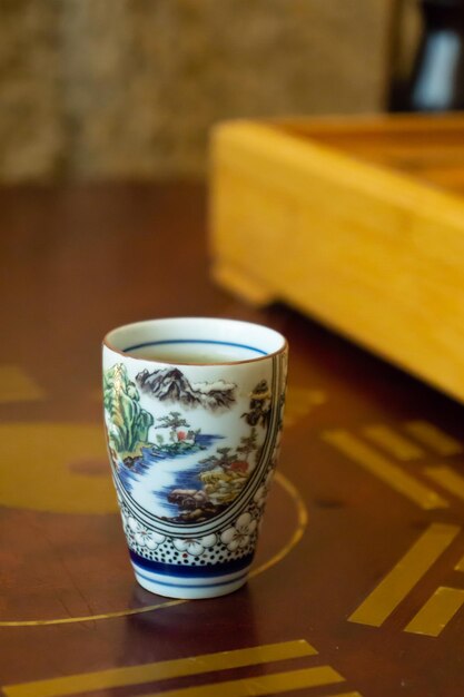 A glass of green tea at chinese tea ceremony