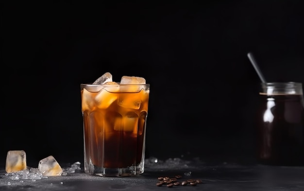 A glass of ice and a glass of coffee with a drink on a black background.