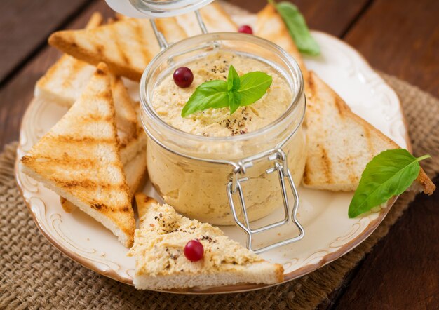 glass jar filled with chicken pate