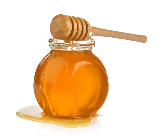 Glass jar full of honey