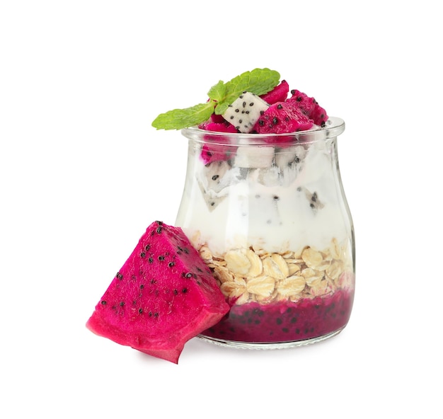 Glass jar of granola with different pitahayas yogurt and mint on white background