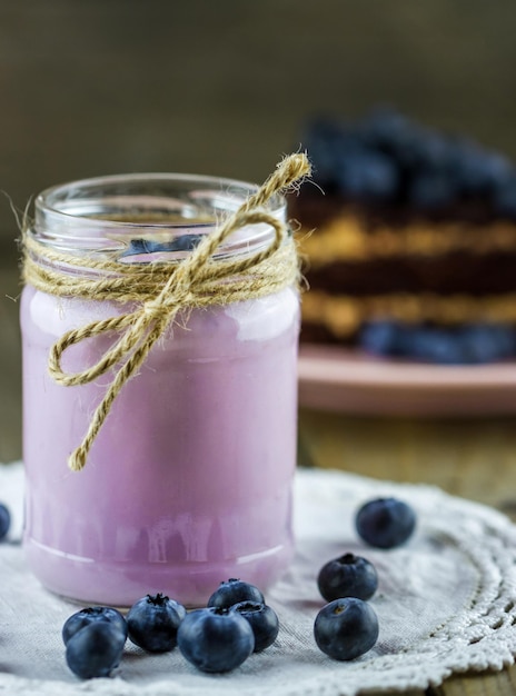 Glass jar of handmade blueberry yogurt
