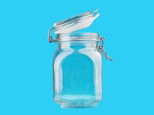 Glass jar isolate on a blue background