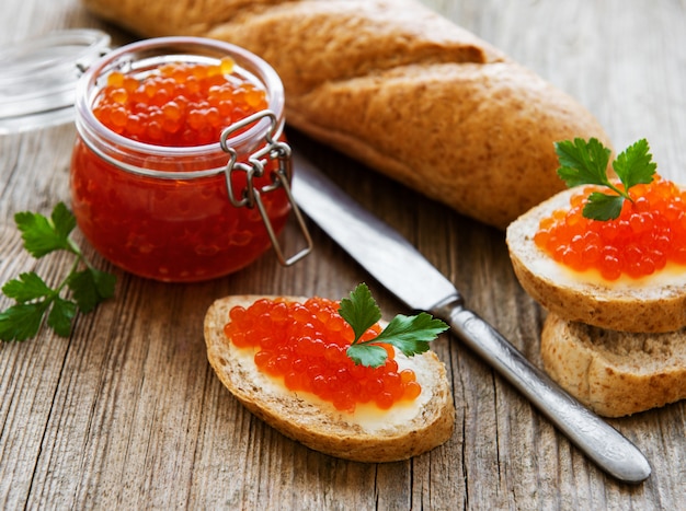 Glass jar of red caviar