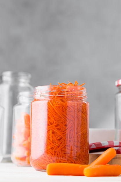 Photo glass jar with chopped baby carrots