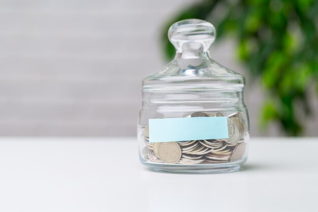 Glass jar with coins