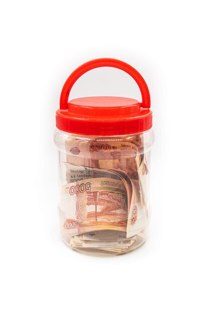 Glass jar with Russian money Save or hide money in the bank High quality photo