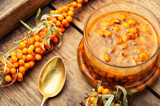 Glass jar with sea buckthorn jam