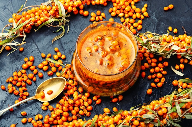 Glass jar with sea buckthorn jam