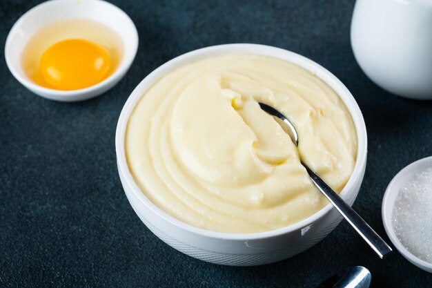 glass jar with vanilla pudding custard cream traditional cream