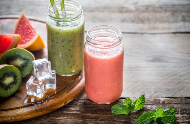 Photo glass jars of fruit  smoothies