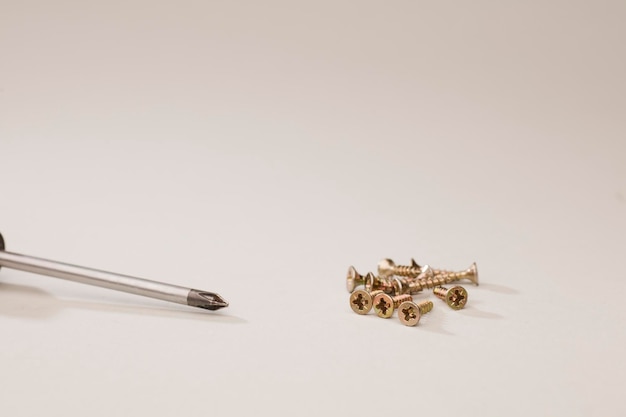 glass jars with cork, organization of nails screws, nuts with soft green background