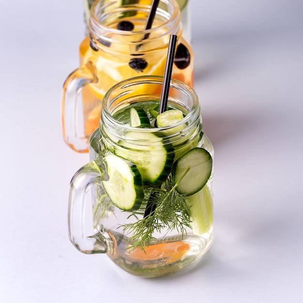 Glass Jars with Fresh Infused Water Made With Organic Fruits and Vegetables Healthy Detox Drink