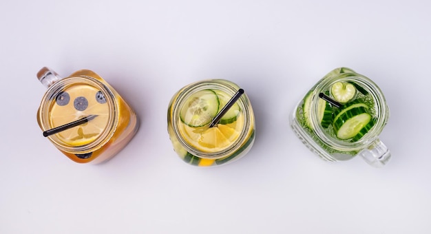 Glass Jars with Fresh Infused Water Made With Organic Fruits and Vegetables Healthy Detox Drink