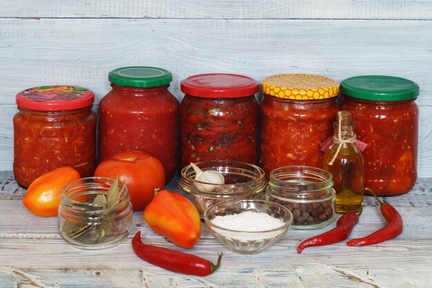Glass jars with tinned vegetables and tomatoes