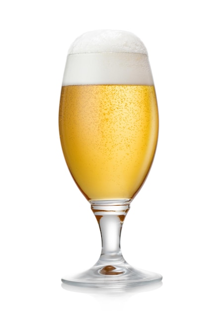 Glass of lager draught craft ipa premium beer with foam on white