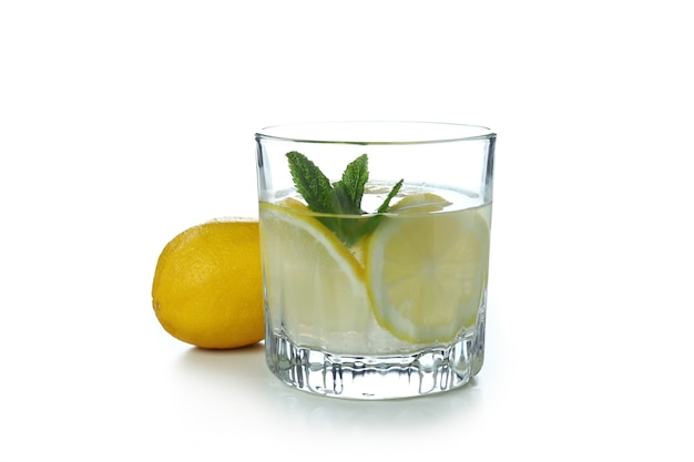 Glass of lemonade isolated on white surface