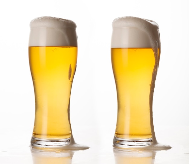 Glass of light beer isolated