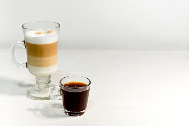 Glass of macchiato latte and espresso.