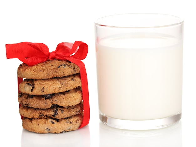 Glass of milk and cookies isolated on white