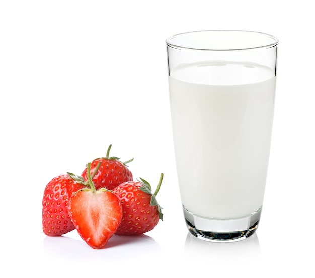 Glass of milk and strawberry on white background